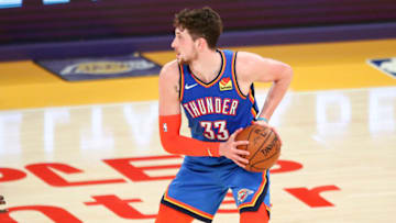 Mike Muscala #33 of the OKC Thunder handles the ball against the Lakers. (Photo by Meg Oliphant/Getty Images)