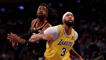 NEW YORK, NEW YORK - NOVEMBER 23: Anthony Davis #3 of the Los Angeles Lakers and Nerlens Noel #3 of the New York Knicks fight for position at the free throw line at Madison Square Garden on November 23, 2021 in New York City. The New York Knicks defeated the Los Angeles Lakers 106-100. NOTE TO USER: User expressly acknowledges and agrees that, by downloading and or using this photograph, User is consenting to the terms and conditions of the Getty Images License Agreement. (Photo by Elsa/Getty Images)