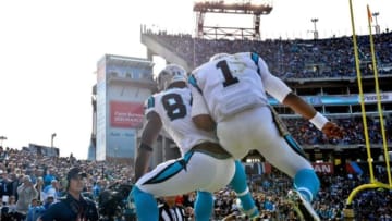 Nov 15, 2015; Nashville, TN, USA; Carolina Panthers tight end Ed Dickson (84) catches a pass for a touchdown and celebrates with Carolina Panthers quarterback Cam Newton (1) during the first half against the Tennessee Titans at Nissan Stadium. Mandatory Credit: Jim Brown-USA TODAY Sports