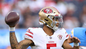 INGLEWOOD, CALIFORNIA - AUGUST 22:Trey Lance #5 of the San Francisco 49ers prepares to pass during a preseason game between the Los Angeles Chargers and the San Francisco 49ers at SoFi Stadium on August 22, 2021 in Inglewood, California. (Photo by Harry How/Getty Images)