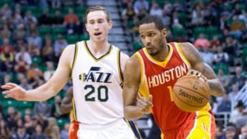 Mar 12, 2015; Salt Lake City, UT, USA; Houston Rockets forward Trevor Ariza (1) dribbles the ball in front of Utah Jazz forward Gordon Hayward (20) during the first quarter at EnergySolutions Arena. Mandatory Credit: Russ Isabella-USA TODAY Sports