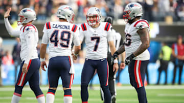 INGLEWOOD, CALIFORNIA - OCTOBER 31: Jake Bailey #7 of the New England Patriots celebrates a field goal with Joe Cardona #49 in the third quarter against the Los Angeles Chargers at SoFi Stadium on October 31, 2021 in Inglewood, California. (Photo by Meg Oliphant/Getty Images)