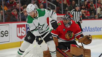 Feb 18, 2022; Chicago, Illinois, USA; Dallas Stars center Joe Pavelski (16) skates with the puck in front of Chicago Blackhawks goaltender Marc-Andre Fleury (29) during the second period at the United Center. Mandatory Credit: Dennis Wierzbicki-USA TODAY Sports