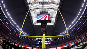 ARLINGTON, TEXAS - DECEMBER 31: A general view of AT&T Stadium during the national anthem prior to the Goodyear Cotton Bowl Classic for the College Football Playoff semifinal game on December 31, 2021 in Arlington, Texas. (Photo by Ron Jenkins/Getty Images)