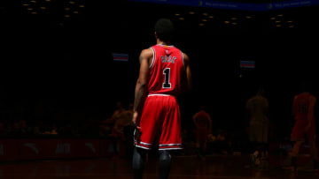 BROOKLYN, NY - NOVEMBER 30: Derrick Rose #1 of the Chicago Bulls during the game against the Brooklyn Nets at Barclays Center in Brooklyn, NY. NOTE TO USER: User expressly acknowledges and agrees that, by downloading and or using this photograph, User is consenting to the terms and conditions of the Getty Images License Agreement. Mandatory Copyright Notice: Copyright 2014 NBAE (Photo by Nathaniel S. Butler/NBAE via Getty Images)