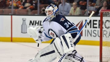 Apr 5, 2016; Anaheim, CA, USA; Winnipeg Jets goalie Michael Hutchinson (34) defends the goal in the first period against the Anaheim Ducks during an NHL game at Honda Center. Mandatory Credit: Kirby Lee-USA TODAY Sports