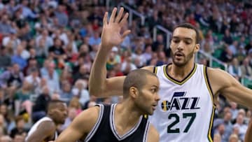 Apr 5, 2016; Salt Lake City, UT, USA; San Antonio Spurs guard Tony Parker (9) dribbles the ball in front of Utah Jazz center Rudy Gobert (27) during the second half at Vivint Smart Home Arena. San Antonio won 88-86. Mandatory Credit: Russ Isabella-USA TODAY Sports