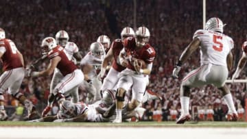 MADISON, WI - OCTOBER 15: Alex Hornibrook #12 of the Wisconsin Badgers runs with the football during the second quarter against the Ohio State Buckeyes at Camp Randall Stadium on October 15, 2016 in Madison, Wisconsin. (Photo by Mike McGinnis/Getty Images)