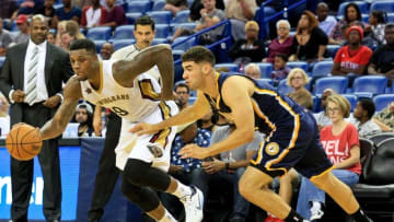 Oct 4, 2016; New Orleans, LA, USA; New Orleans Pelicans forward Terrence Jones (9) drives past Indiana Pacers forward Georges Niang (32) during the second half of a game at the Smoothie King Center. The Pacers defeated the Pelicans 113-96. Mandatory Credit: Derick E. Hingle-USA TODAY Sports