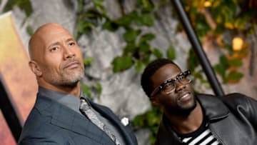 LONDON, ENGLAND - DECEMBER 07: Dwayne Johnson (L) and Kevin Hart attend the 'Jumanji: Welcome To The Jungle' UK premiere held at Vue West End on December 7, 2017 in London, England. (Photo by Jeff Spicer/Jeff Spicer/Getty Images)