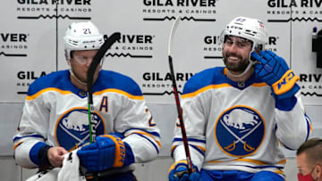 Jan 29, 2022; Glendale, Arizona, USA; Buffalo Sabres right wing Alex Tuch (89) celebrates with right wing Kyle Okposo (21) after scoring against the Arizona Coyotes in the second period at Gila River Arena. Mandatory Credit: Rick Scuteri-USA TODAY Sports