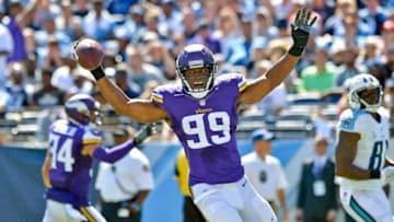 Sep 11, 2016; Nashville, TN, USA; Minnesota Vikings defensive end Danielle Hunter (99) picks up a Tennessee Titans fumble and runs for a touchdown during the second half at Nissan Stadium. Minnesota won 25-16. Mandatory Credit: Jim Brown-USA TODAY Sports