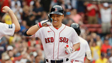 BOSTON, MA - JULY 9: Masataka Yoshida #7 of the Boston Red Sox celebrates after his go-ahead home run against the Oakland Athletics during the eighth inning at Fenway Park on July 9, 2023 in Boston, Massachusetts. (Photo By Winslow Townson/Getty Images)