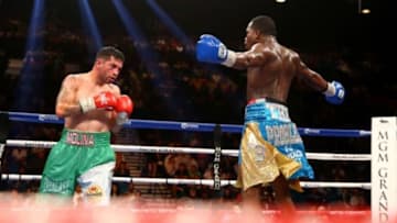 May 3, 2014; Las Vegas, NV, USA; Adrien Broner (right) taunts Carlos Molina during their fight at MGM Grand. Mandatory Credit: Mark J. Rebilas-USA TODAY Sports
