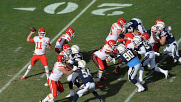 Jan 1, 2017; San Diego, CA, USA; Kansas City Chiefs quarterback Alex Smith (11) passes against the San Diego Chargers during the second quarter at Qualcomm Stadium. Mandatory Credit: Jake Roth-USA TODAY Sports