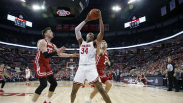 COLUMBUS, OHIO - JANUARY 03: Kaleb Wesson #34 of the Ohio State takes the ball away from Brad Davison #34 and Micah Potter #11 of the Wisconsin Badgers during the first half at Value City Arena on January 03, 2020 in Columbus, Ohio. (Photo by Justin Casterline/Getty Images)