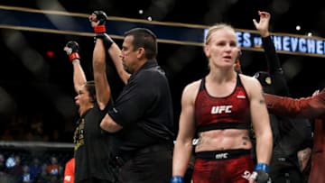 EDMONTON, AB - SEPTEMBER 09: Amanda Nunes, left, reacts after defeating Valentina Shevchenko, right, during UFC 215 at Rogers Place on September 9, 2017 in Edmonton, Canada. (Photo by Codie McLachlan/Getty Images)