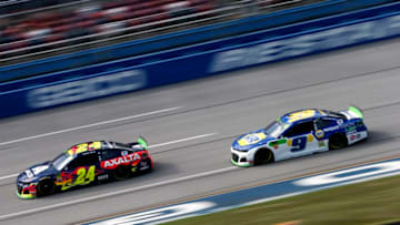 TALLADEGA, ALABAMA - OCTOBER 11: William Byron, driver of the #24 Axalta Chevrolet, leads Chase Elliott, driver of the #9 NAPA Night Vision Chevrolet, during practice for the Monster Energy NASCAR Cup Series 1000Bulbs.com 500 at Talladega Superspeedway on October 11, 2019 in Talladega, Alabama. (Photo by Brian Lawdermilk/Getty Images)