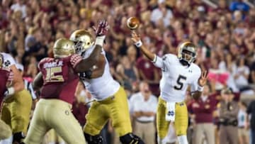 Oct 18, 2014; Tallahassee, FL, USA; Notre Dame Fighting Irish quarterback Everett Golson (5) throws in the first quarter against the Florida State Seminoles at Doak Campbell Stadium. Mandatory Credit: Matt Cashore-USA TODAY Sports