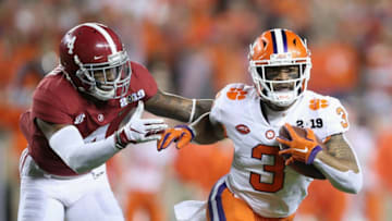SANTA CLARA, CA - JANUARY 07: Amari Rodgers #3 of the Clemson Tigers carries the ball against Christopher Allen #4 of the Alabama Crimson Tidein the CFP National Championship presented by AT&T at Levi's Stadium on January 7, 2019 in Santa Clara, California. (Photo by Christian Petersen/Getty Images)