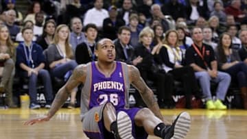 February 2, 2013; Oakland, CA, USA; Phoenix Suns guard Shannon Brown (26) sits on the ground after attempting a shot against the Golden State Warriors in the first quarter at ORACLE Arena. Mandatory Credit: Cary Edmondson-USA TODAY Sports