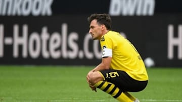 Dortmund's German defender Mats Hummels reacts during the German first division Bundesliga football match BVB Borussia Dortmund v TSG 1899 Hoffenheim on June 27, 2020 in Dortmund, western Germany. (Photo by Ina FASSBENDER / various sources / AFP) / DFL REGULATIONS PROHIBIT ANY USE OF PHOTOGRAPHS AS IMAGE SEQUENCES AND/OR QUASI-VIDEO (Photo by INA FASSBENDER/AFP via Getty Images)