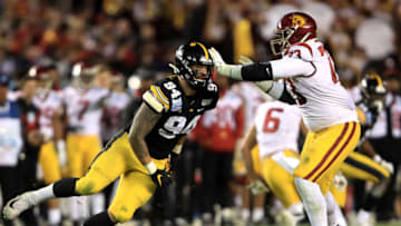 SAN DIEGO, CALIFORNIA - DECEMBER 27: Austin Jackson #73 of the USC Trojans blocks A.J. Epenesa #94 of the Iowa Hawkeyes during the second half of the San Diego County Credit Union Holiday Bowl at SDCCU Stadium on December 27, 2019 in San Diego, California. (Photo by Sean M. Haffey/Getty Images)
