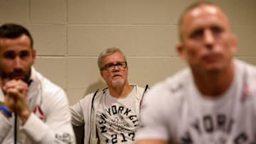 NEW YORK, NY - NOVEMBER 04: Trainer Freddie Roach (C) waits in the locker room with Georges St-Pierre of Canada before his fight against Michael Bisping of England during the UFC 217 event at Madison Square Garden on November 4, 2017 in New York City. (Photo by Mike Roach/Zuffa LLC/Zuffa LLC via Getty Images)
