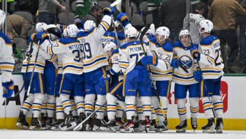 Jan 23, 2023; Dallas, Texas, USA; The Buffalo Sabres celebrate the overtime win over the Dallas Stars at the American Airlines Center. Mandatory Credit: Jerome Miron-USA TODAY Sports