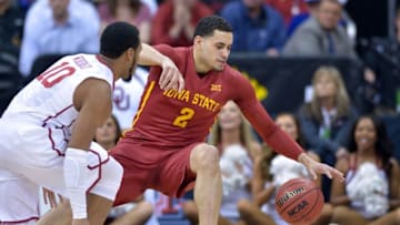 Mar 10, 2016; Kansas City, MO, USA; Iowa State Cyclones forward Abdel Nader (2) drives the basket as Oklahoma Sooners guard Jordan Woodard (10) defends in the second half during the Big 12 Conference tournament at Sprint Center. The Oklahoma Sooners won 79-76. Mandatory Credit: Denny Medley-USA TODAY Sports