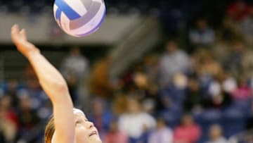 Washington's Courtney Thompson (3) serves the ball during the NCAA Division I women's volleyball semifinal match between the Washington Huskies and the Tennessee Lady Vols, December 15, 2005, at the Alamo Dome, San Antonio, Texas. Washington defeated Tennessee in three straight sets to advance to the final. (Photo by Darren Abate/Getty Images)