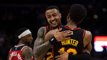 WASHINGTON, DC - MARCH 04: John Collins #20 of the Atlanta Hawks celebrates with De'Andre Hunter #12 after the game against the Washington Wizards at Capital One Arena on March 4, 2022 in Washington, DC. NOTE TO USER: User expressly acknowledges and agrees that, by downloading and or using this photograph, User is consenting to the terms and conditions of the Getty Images License Agreement. (Photo by Scott Taetsch/Getty Images)