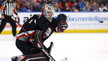 Dec 29, 2022; Buffalo, New York, USA; Buffalo Sabres goaltender Ukko-Pekka Luukkonen (1) looks to make a glove save during the third period against the Detroit Red Wings at KeyBank Center. Mandatory Credit: Timothy T. Ludwig-USA TODAY Sports