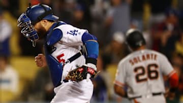 LOS ANGELES, CALIFORNIA - APRIL 02: Russell Martin #55 of the Los Angeles Dodgers celebrates the game-ending double play against the San Francisco Giants at Dodger Stadium on April 02, 2019 in Los Angeles, California. (Photo by Yong Teck Lim/Getty Images)