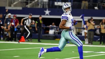 ARLINGTON, TEXAS - DECEMBER 09: Amari Cooper #19 of the Dallas Cowboys looks behind him as he breaks away for his secodn touchdown in the fourth quarter against the Philadelphia Eagles at AT&T Stadium on December 09, 2018 in Arlington, Texas. (Photo by Richard Rodriguez/Getty Images)