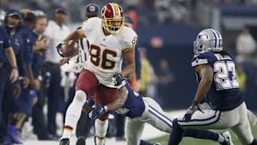 Nov 24, 2016; Arlington, TX, USA; Washington Redskins tight end Jordan Reed (86) runs the ball against Dallas Cowboys strong safety J.J. Wilcox (27) in the first quarter at AT&T Stadium. Mandatory Credit: Tim Heitman-USA TODAY Sports