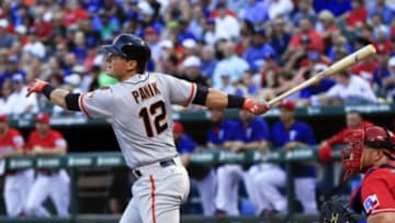 Aug 1, 2015; Arlington, TX, USA; San Francisco Giants second baseman Joe Panik (12) hits an rbi double during the third inning against the Texas Rangers at Globe Life Park in Arlington. Mandatory Credit: Kevin Jairaj-USA TODAY Sports