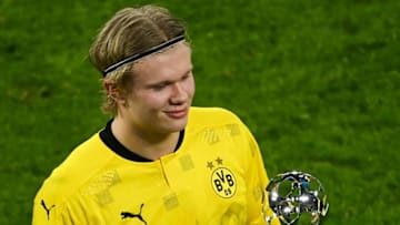 Dortmund's Norwegian forward Erling Braut Haaland holds his "man of the match" trophy after the UEFA Champions League (Photo by INA FASSBENDER/POOL/AFP via Getty Images)