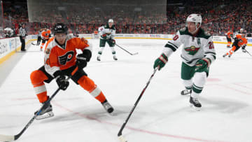 PHILADELPHIA, PA - NOVEMBER 12: Matt Read #24 of the Philadelphia Flyers backhands the puck against Ryan Suter #20 of the Minnesota Wild on November 12, 2016 at the Wells Fargo Center in Philadelphia, Pennsylvania. (Photo by Len Redkoles/NHLI via Getty Images)