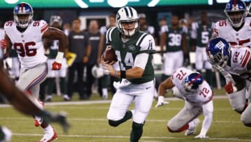 EAST RUTHERFORD, NJ - AUGUST 24: Sam Darnold #14 of the New York Jets runs the ball during their preseason game against the New York Giants at MetLife Stadium on August 24, 2018 in East Rutherford, New Jersey. (Photo by Jeff Zelevansky/Getty Images)