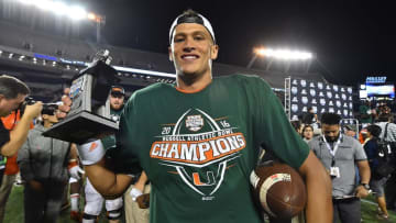 Dec 28, 2016; Orlando, FL, USA; Miami Hurricanes quarterback Brad Kaaya (15) celebrates defeating the West Virginia Mountaineers 31-14 and being names MVP pf the game at Camping World Stadium. The Miami Hurricanes defeat the West Virginia Mountaineers 31-14. Mandatory Credit: Jasen Vinlove-USA TODAY Sports