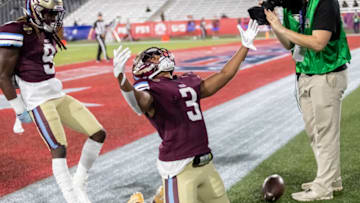 May 6, 2022; Birmingham, AL, USA; Michigan Panthers running back Reggie Corbin (3) celebrates a long touchdown run against the Philadelphia Stars during the first half at Protective Stadium. Michigan Panthers wide receiver Ray Bolden (9) is also in frame. Mandatory Credit: Vasha Hunt-USA TODAY Sports