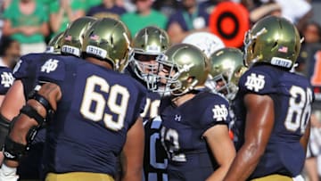 SOUTH BEND, IN - SEPTEMBER 15: Ian Book #12 of the Notre Dame Fighting Irish calls a play against the Vanderbilt Commodores at Notre Dame Stadium on September 15, 2018 in South Bend, Indiana. Notre Dame defeated Vanderbilt 22-17. (Photo by Jonathan Daniel/Getty Images)