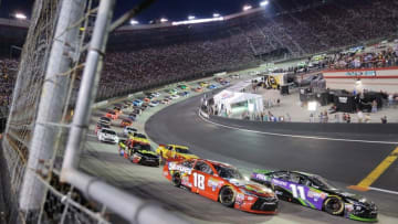 Aug 22, 2015; Bristol, TN, USA; NASCAR Sprint Cup Series driver Kyle Busch (18) and Denny Hamlin (11) Irwin Tools Night Race at Bristol Motor Speedway. Mandatory Credit: Randy Sartin-USA TODAY Sports