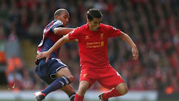 LIVERPOOL, ENGLAND - OCTOBER 07: Steven N' Zonzi of Stoke City challenges Nuri Sahin of Liverpool during the Barclays Premier League match between Liverpool and Stoke City at Anfield on October 7, 2012 in Liverpool, England. (Photo by Clive Brunskill/Getty Images)
