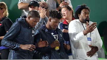 Aug 14, 2016; Rio de Janeiro, Brazil; USA basketball players Kevin Durant, Jimmy Butler and DeAndre Jordan attend the women
