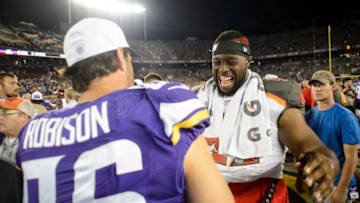 MINNEAPOLIS, MN - AUGUST 15: Brian Robison #96 of the Minnesota Vikings and Gerald McCoy #93 of the Tampa Bay Buccaneers speak after the preseason game on August 15, 2015 at TCF Bank Stadium in Minneapolis, Minnesota. The Vikings defeated the Buccaneers 26-16. (Photo by Hannah Foslien/Getty Images)
