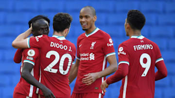 BRIGHTON, ENGLAND - NOVEMBER 28: Sadio Mane of Liverpool celebrates with teammates Diogo Jota, Fabinho, and Roberto Firminho after scoring a goal which was then disallowed during the Premier League match between Brighton & Hove Albion and Liverpool at American Express Community Stadium on November 28, 2020 in Brighton, England. Sporting stadiums around the UK remain under strict restrictions due to the Coronavirus Pandemic as Government social distancing laws prohibit fans inside venues resulting in games being played behind closed doors. (Photo by Mike Hewitt/Getty Images)