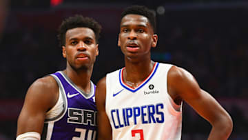 LOS ANGELES, CA - DECEMBER 26: Sacramento Kings Guard Buddy Hield (24) and Los Angeles Clippers Guard Shai Gilgeous-Alexander (2) look on during a NBA game between the Sacramento Kings and the Los Angeles Clippers on December 26, 2018 at STAPLES Center in Los Angeles, CA. (Photo by Brian Rothmuller/Icon Sportswire via Getty Images)