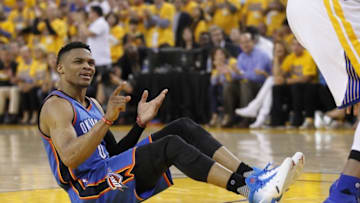 May 26, 2016; Oakland, CA, USA; Oklahoma City Thunder guard Russell Westbrook (0) reacts after being called for an offensive foul against the Golden State Warriors in the fourth quarter in game five of the Western conference finals of the NBA Playoffs at Oracle Arena. The Warriors defeated the Thunder 120-111. Mandatory Credit: Cary Edmondson-USA TODAY Sports